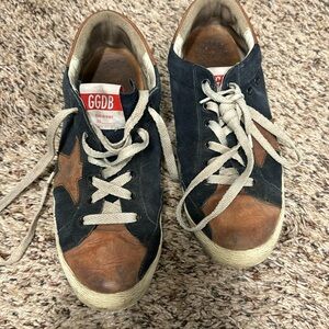 Golden goose women’s super star suede low top sneakers
